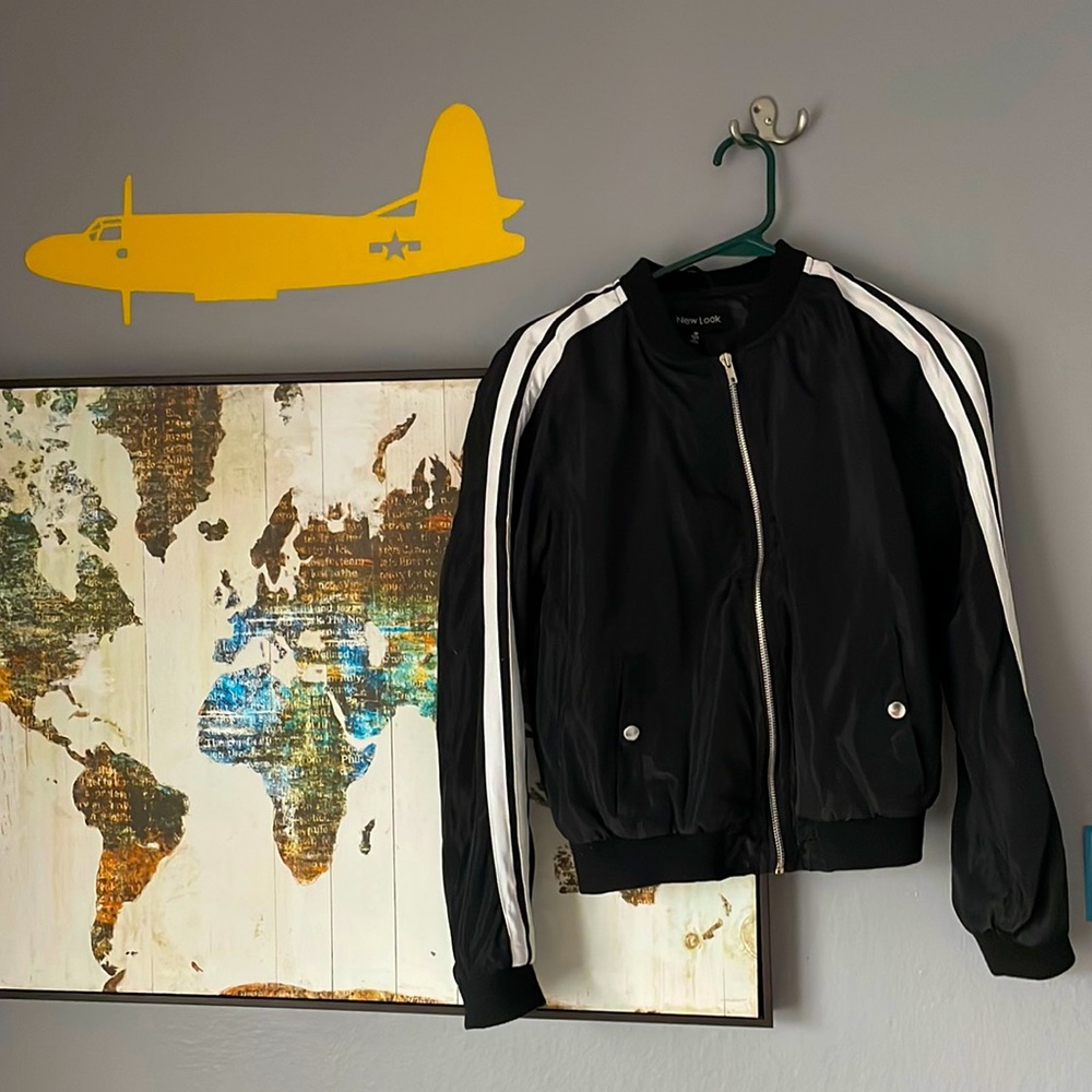 I am selling a light weight bomber jacket it is a polyester material.